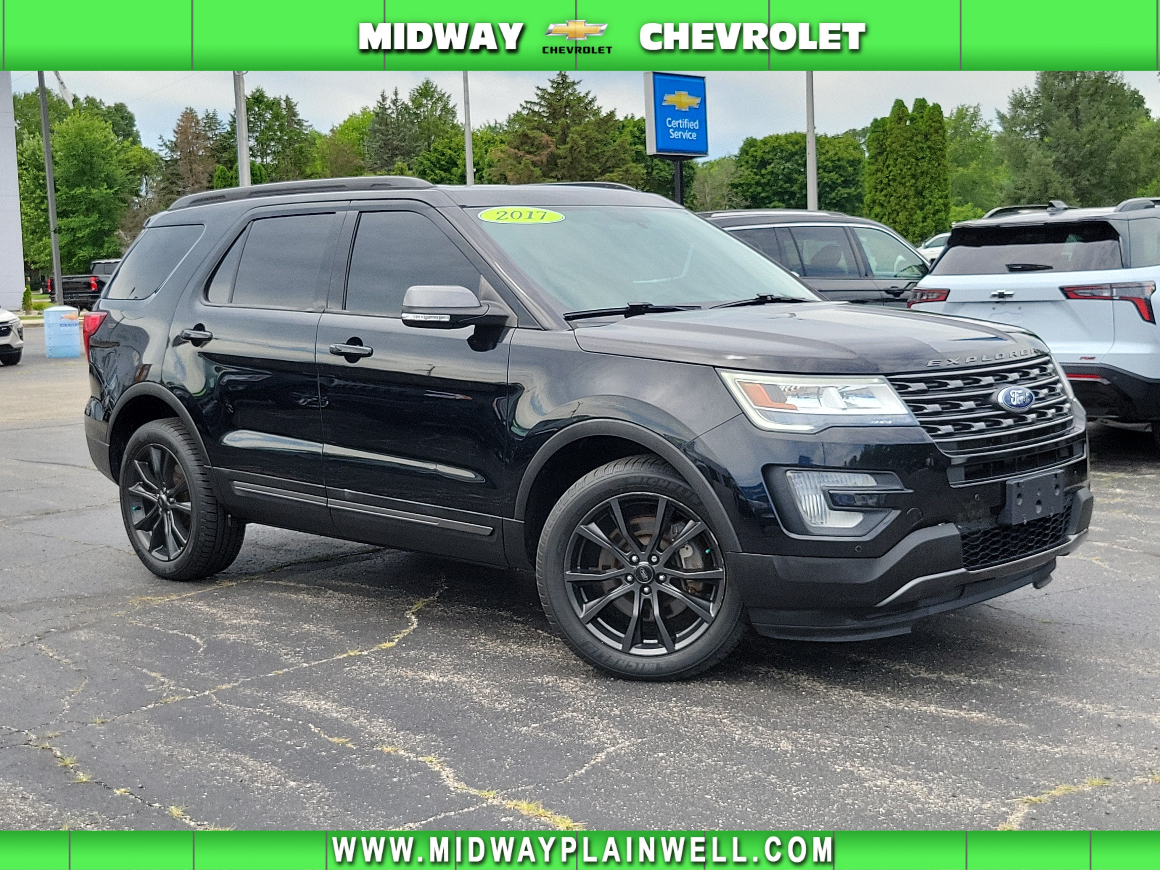 2017 Ford Explorer XLT in Black — front three-quarter view
