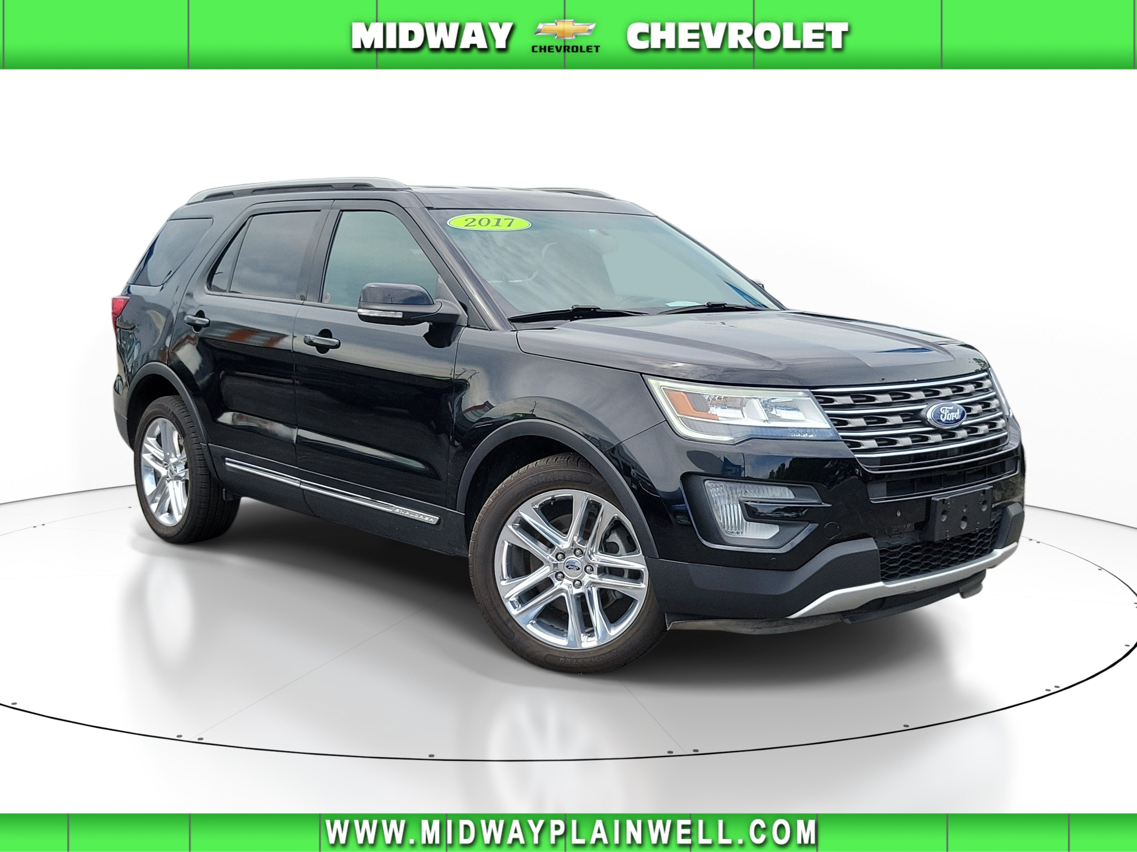 2017 Ford Explorer XLT in Black — front three-quarter view