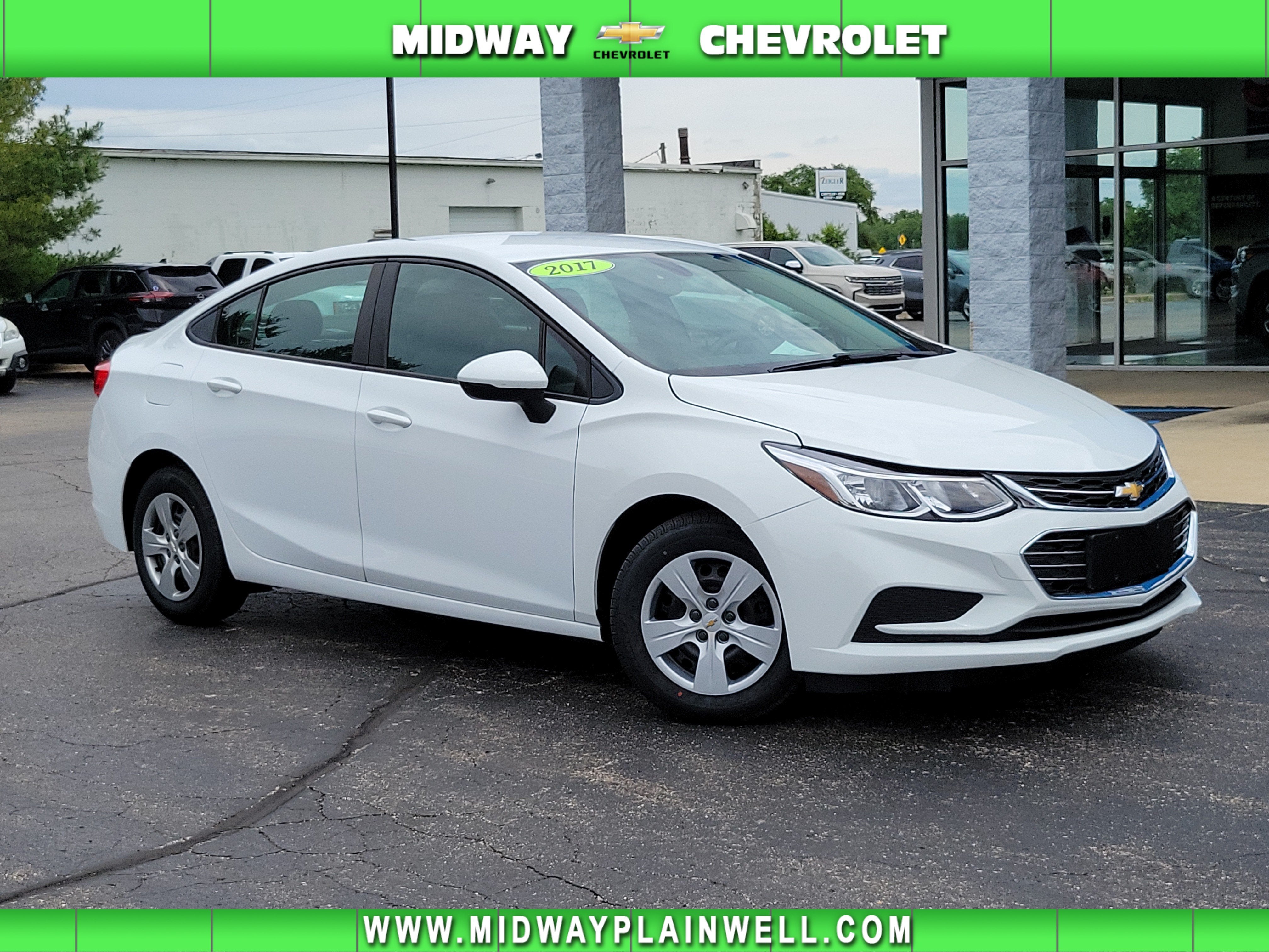 2017 Chevrolet Cruze LS in Summit White — front three-quarter view