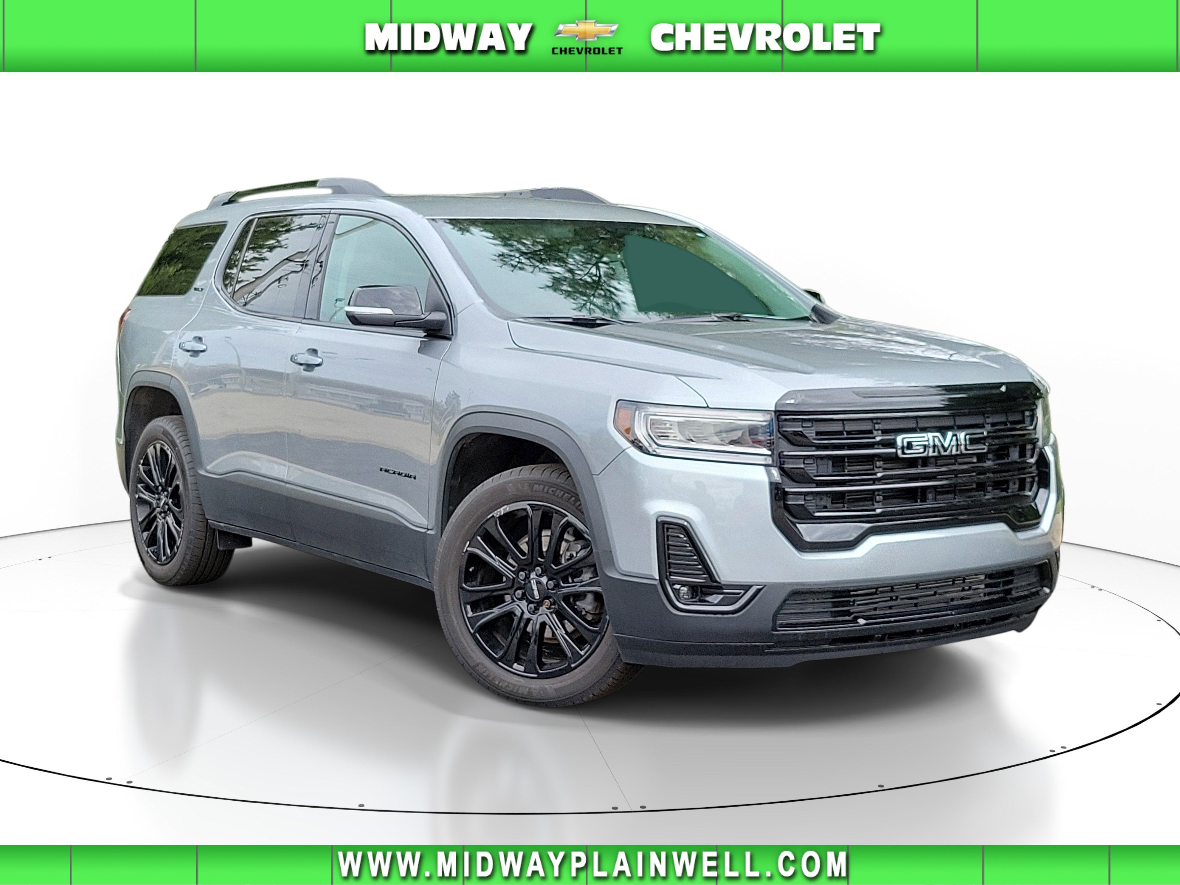2023 GMC Acadia SLT in Sterling Metallic — front three-quarter view