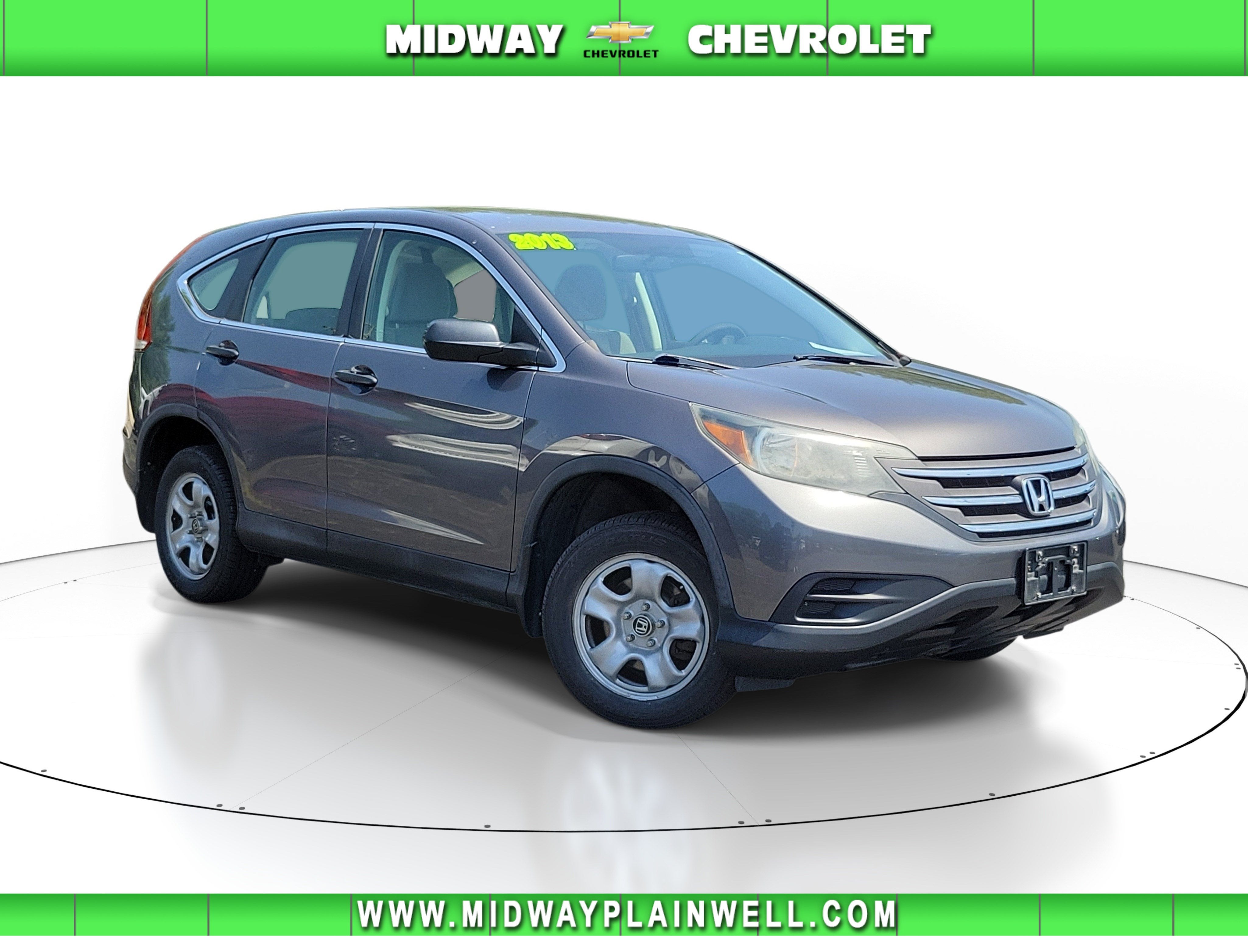 2013 Honda CR-V LX in Gray — front three-quarter view