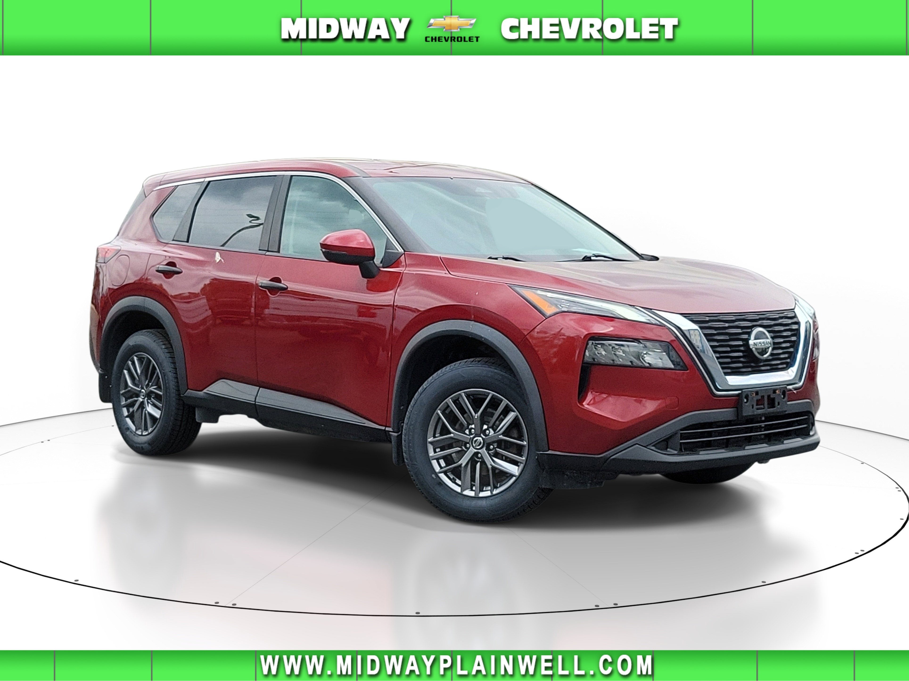 2021 Nissan Rogue S in Red — front three-quarter view